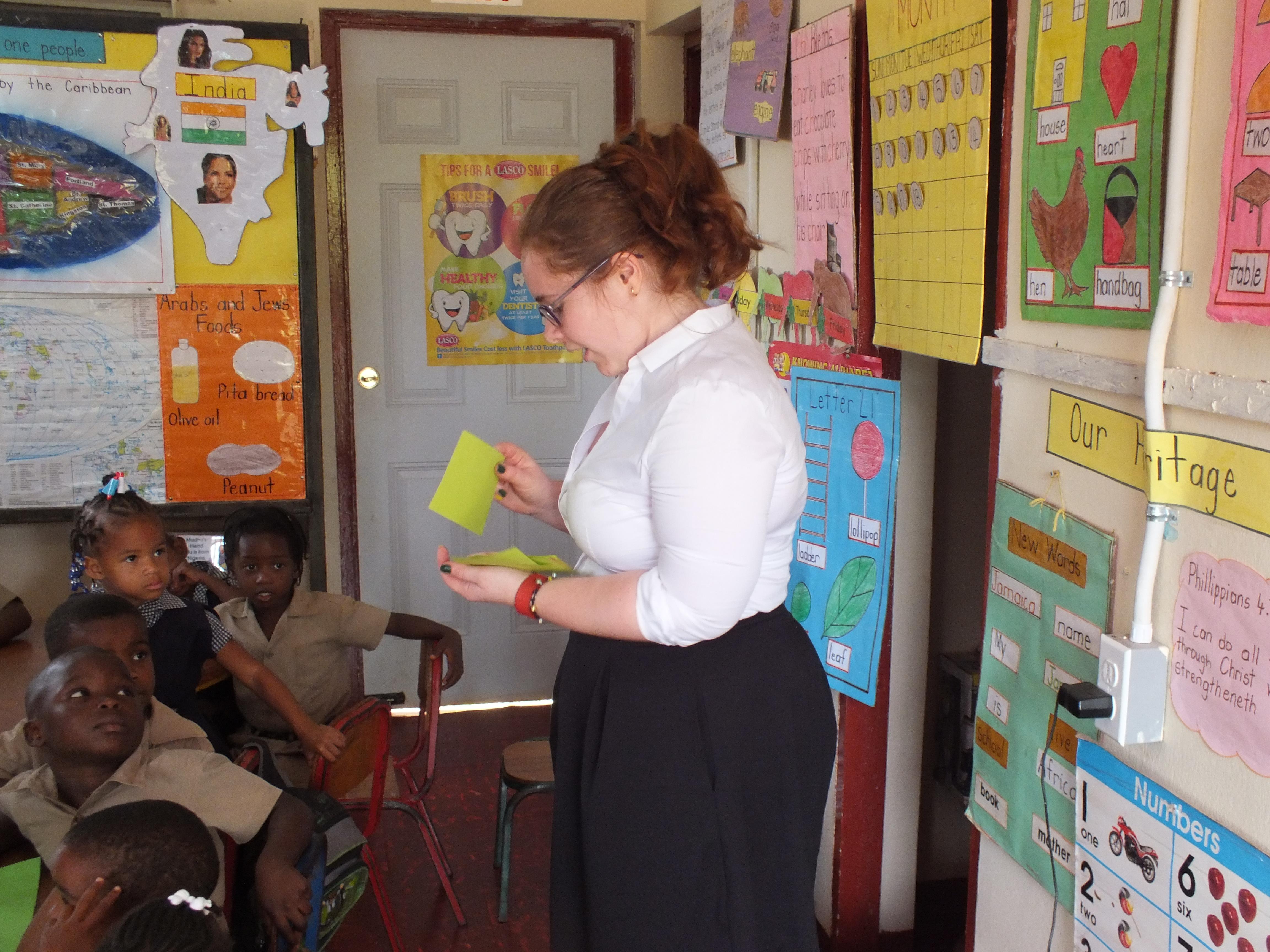 A Human Rights intern in Jamaica runs an educational workshop at a local school. A Human Rights intern gains work experience by teaching Jamaican children about their rights.